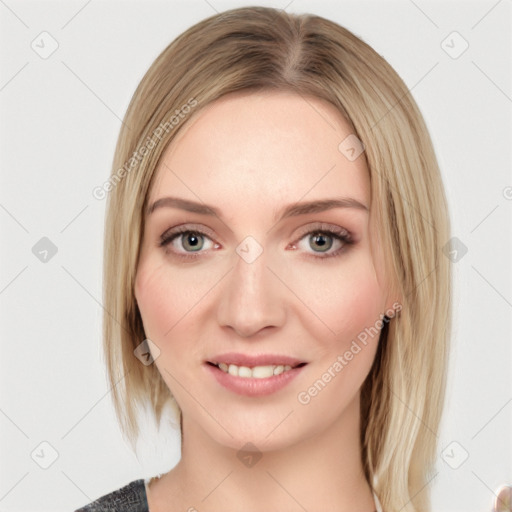 Joyful white young-adult female with medium  brown hair and blue eyes