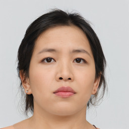 Neutral asian young-adult female with medium  brown hair and brown eyes