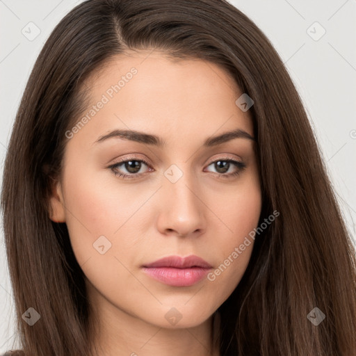 Neutral white young-adult female with long  brown hair and brown eyes