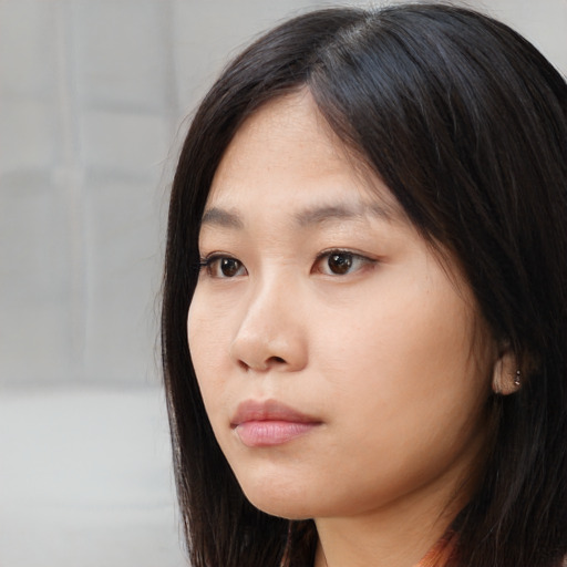 Neutral asian young-adult female with long  brown hair and brown eyes