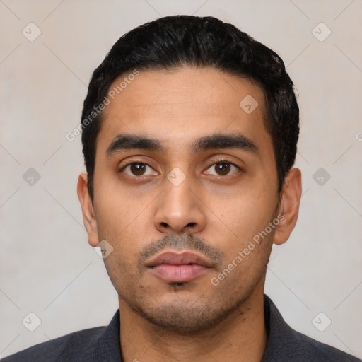 Neutral latino young-adult male with short  black hair and brown eyes