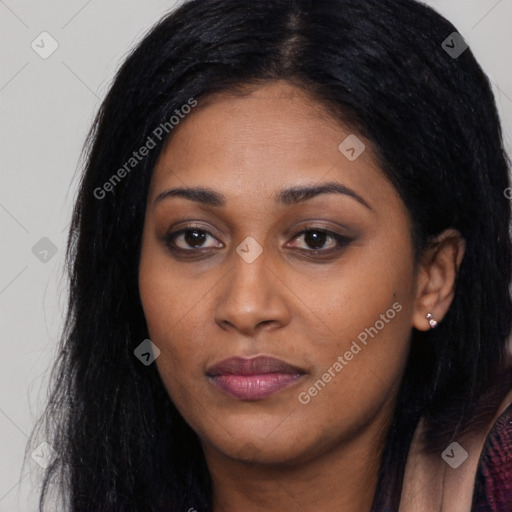 Joyful latino young-adult female with long  black hair and brown eyes