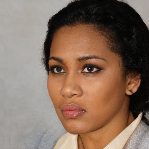 Neutral black young-adult female with short  black hair and brown eyes