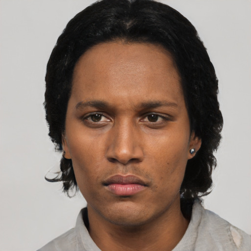 Neutral black young-adult female with short  black hair and brown eyes