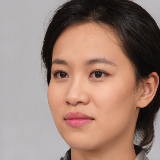 Neutral asian young-adult female with medium  brown hair and brown eyes