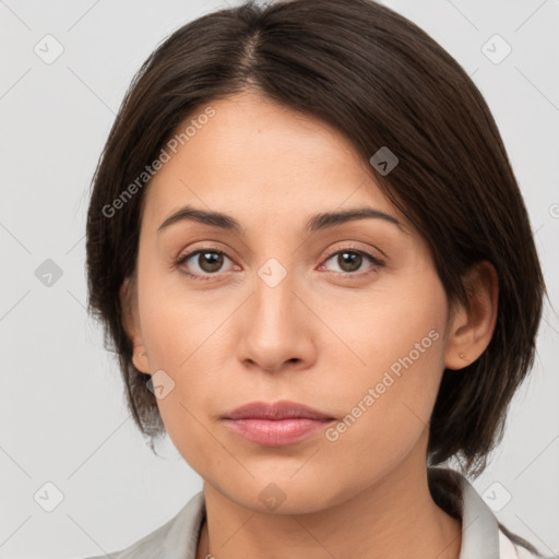 Neutral white young-adult female with medium  brown hair and brown eyes