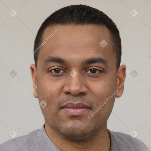 Neutral latino young-adult male with short  black hair and brown eyes