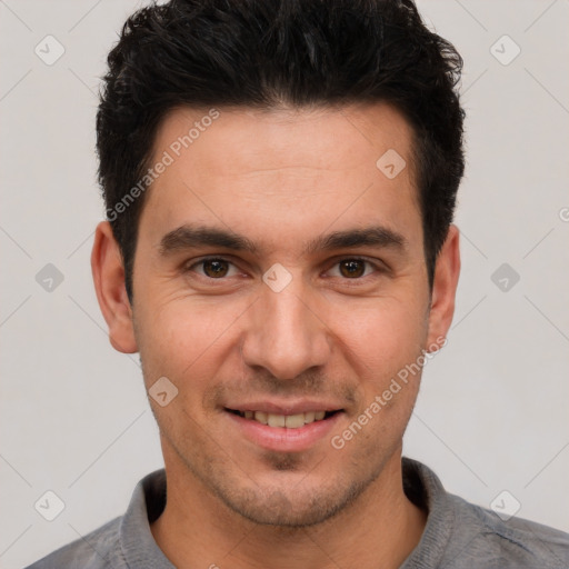 Joyful white young-adult male with short  black hair and brown eyes