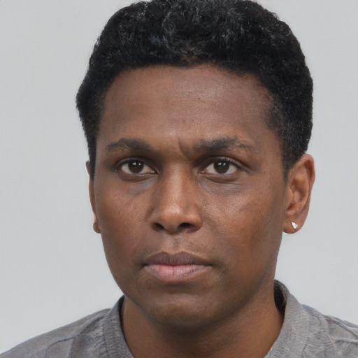 Neutral black young-adult male with short  black hair and brown eyes