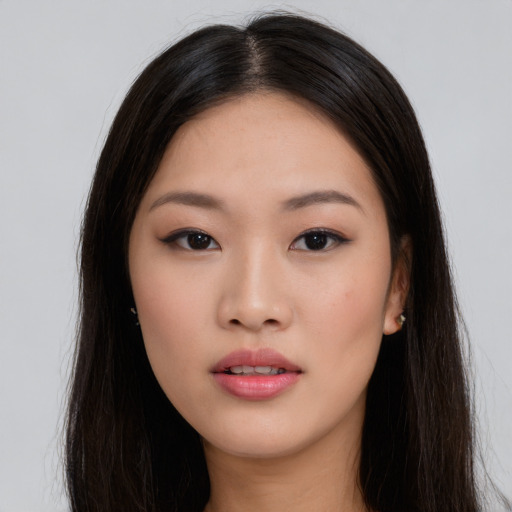 Neutral asian young-adult female with long  black hair and brown eyes