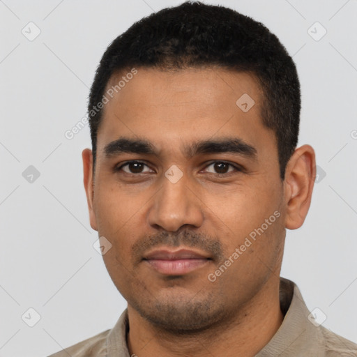 Neutral latino young-adult male with short  black hair and brown eyes
