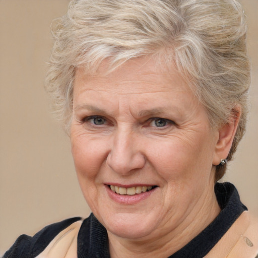 Joyful white middle-aged female with medium  brown hair and brown eyes