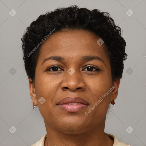 Joyful black young-adult female with short  brown hair and brown eyes