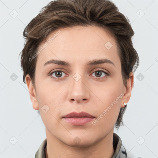 Neutral white young-adult female with short  brown hair and grey eyes