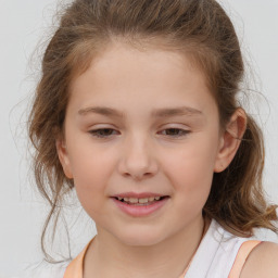 Joyful white child female with medium  brown hair and brown eyes