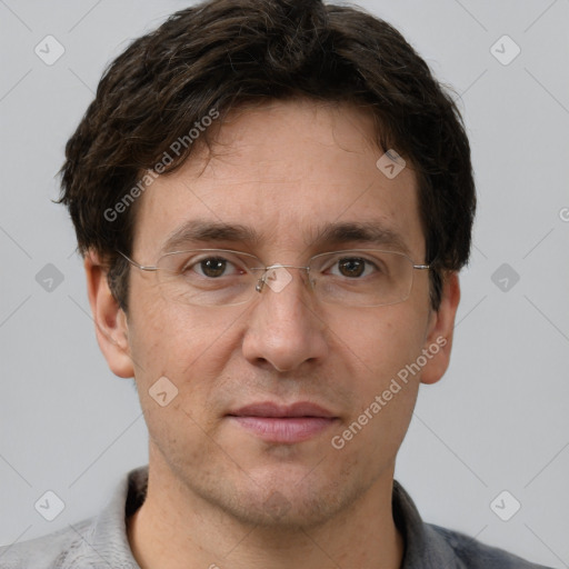 Joyful white adult male with short  brown hair and grey eyes