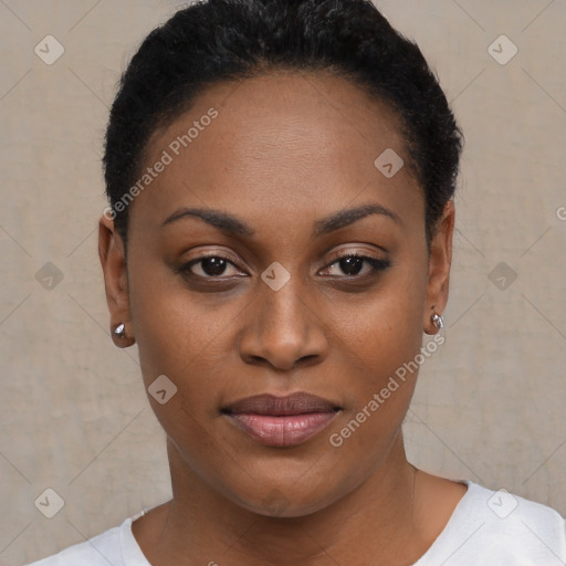 Joyful black young-adult female with short  brown hair and brown eyes