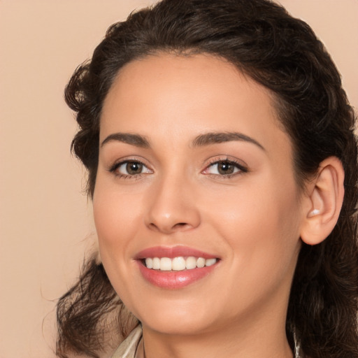 Joyful white young-adult female with medium  brown hair and brown eyes