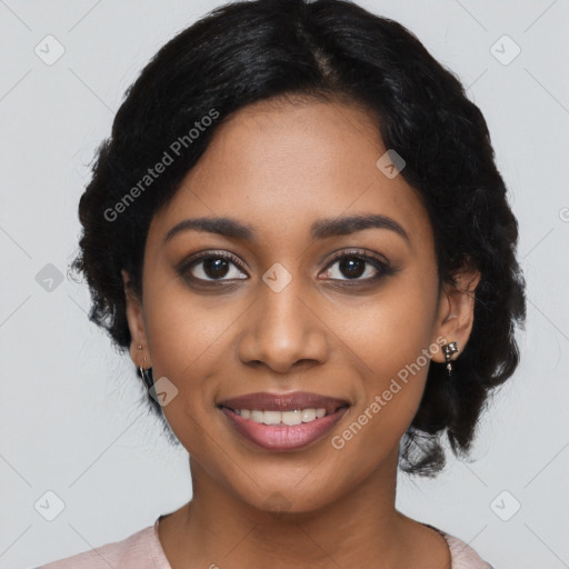 Joyful black young-adult female with long  black hair and brown eyes