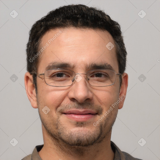 Joyful white adult male with short  brown hair and brown eyes