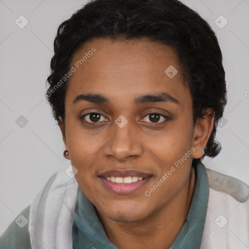 Joyful black young-adult female with short  brown hair and brown eyes