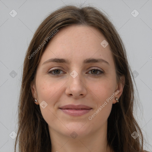 Joyful white young-adult female with long  brown hair and grey eyes