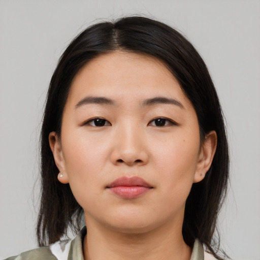 Neutral white young-adult female with medium  black hair and brown eyes