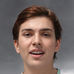 Joyful white young-adult male with medium  brown hair and brown eyes