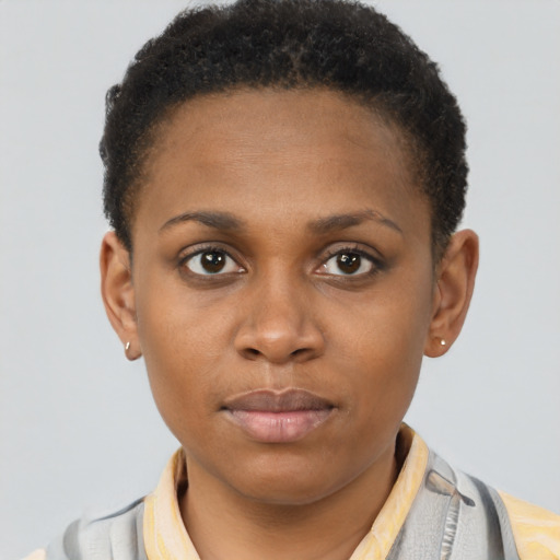 Neutral black young-adult female with short  brown hair and brown eyes