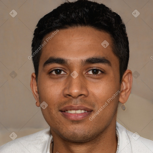 Joyful latino young-adult male with short  black hair and brown eyes