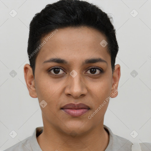 Joyful latino young-adult female with short  brown hair and brown eyes