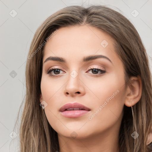 Neutral white young-adult female with long  brown hair and brown eyes