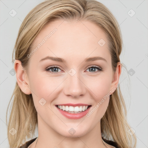 Joyful white young-adult female with long  brown hair and blue eyes