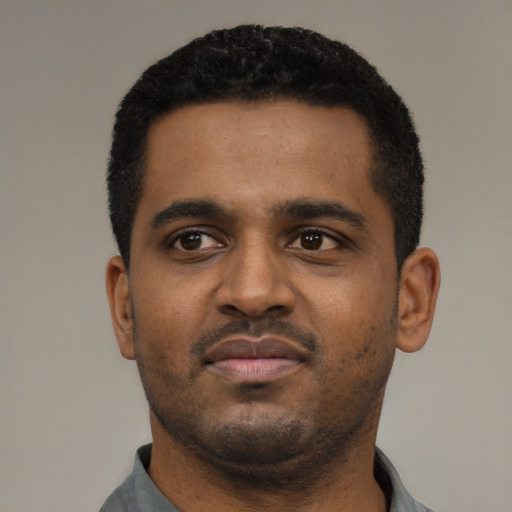 Neutral black young-adult male with short  black hair and brown eyes
