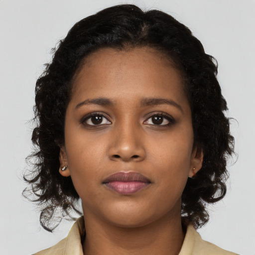Neutral black young-adult female with long  black hair and brown eyes
