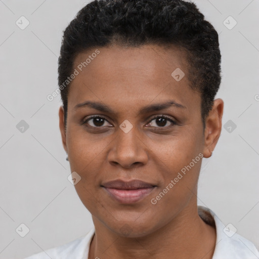 Joyful black young-adult female with short  brown hair and brown eyes