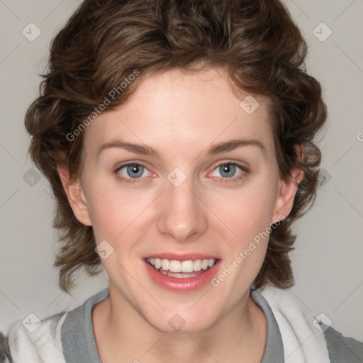 Joyful white young-adult female with medium  brown hair and blue eyes