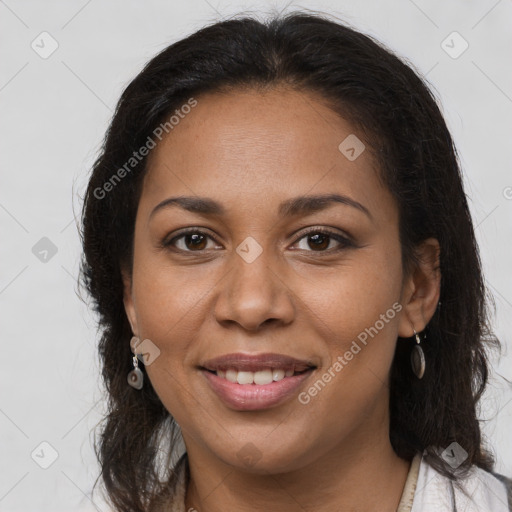 Joyful latino young-adult female with long  brown hair and brown eyes