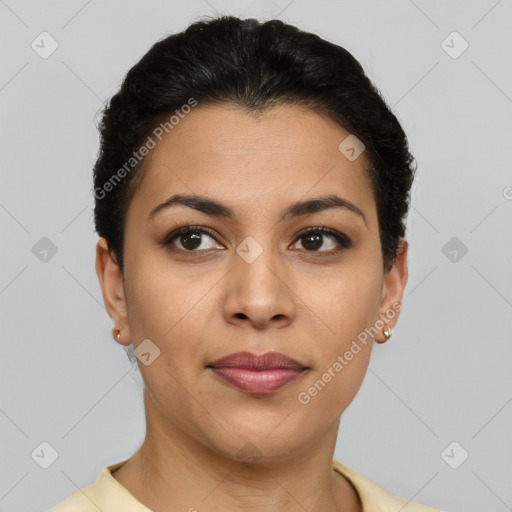 Joyful latino young-adult female with short  brown hair and brown eyes