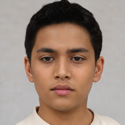 Neutral asian child male with short  black hair and brown eyes