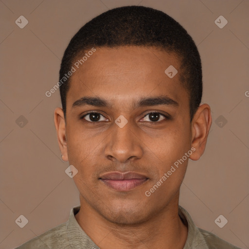 Joyful black young-adult male with short  black hair and brown eyes