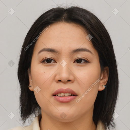 Joyful asian young-adult female with medium  brown hair and brown eyes