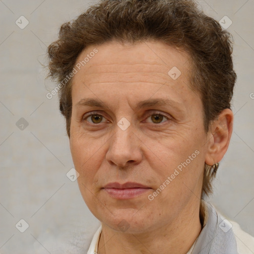 Joyful white adult female with short  brown hair and brown eyes