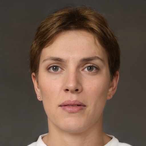 Neutral white young-adult female with short  brown hair and brown eyes