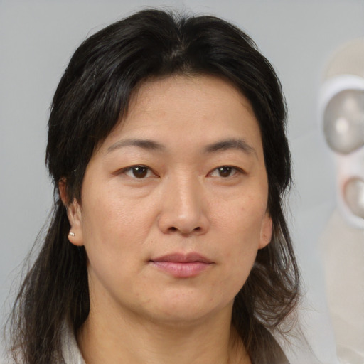 Neutral white adult female with medium  brown hair and brown eyes