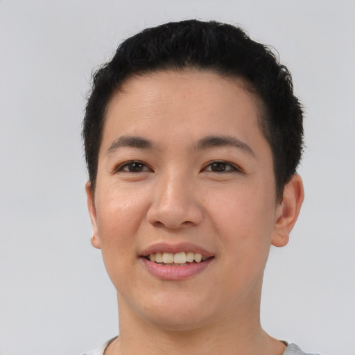 Joyful asian young-adult female with short  brown hair and brown eyes