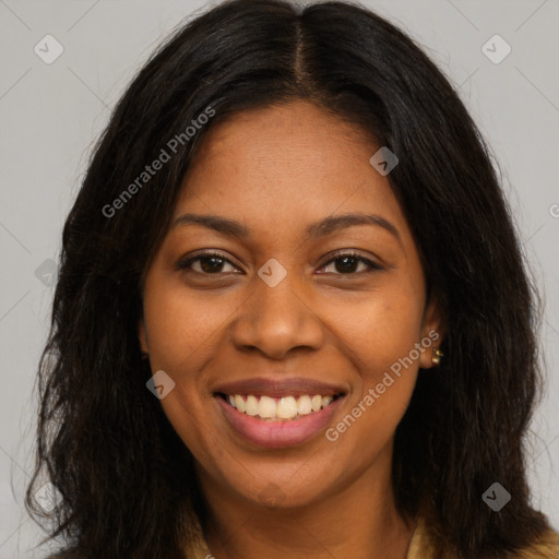 Joyful black young-adult female with long  brown hair and brown eyes