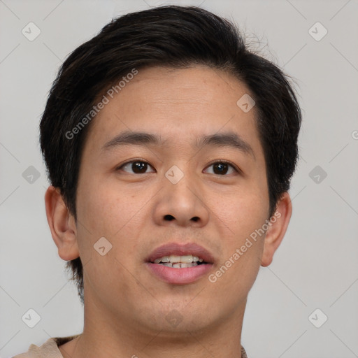 Joyful asian young-adult male with short  brown hair and brown eyes