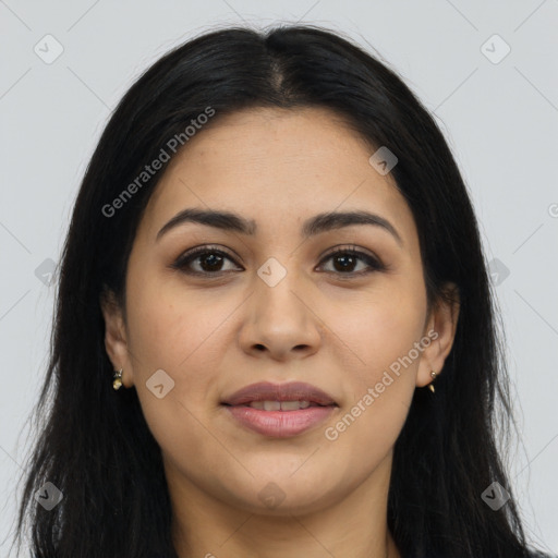 Joyful latino young-adult female with long  brown hair and brown eyes