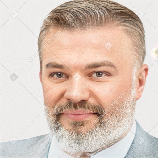 Joyful white adult male with short  brown hair and grey eyes